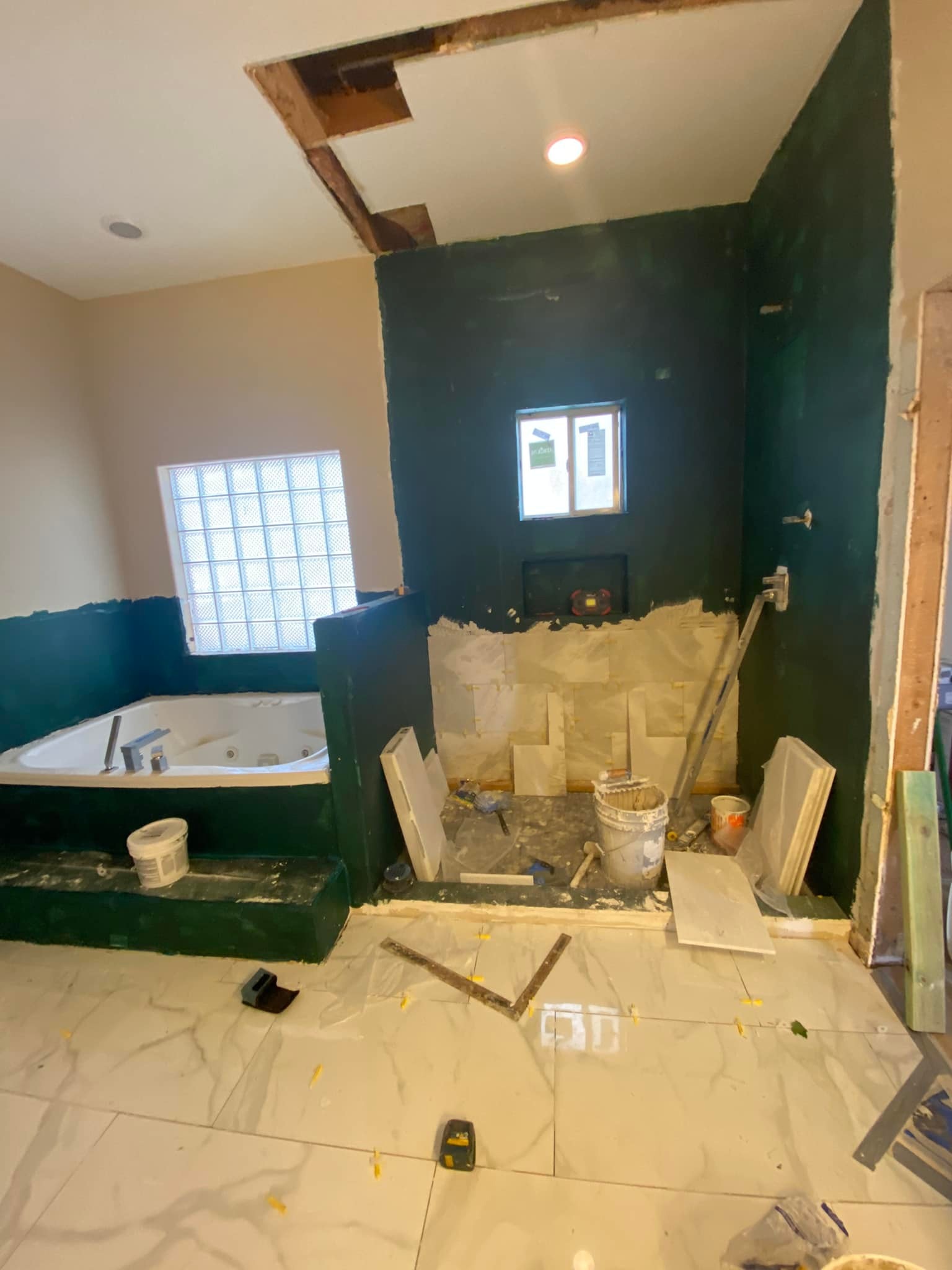 Master Bath — Travertine & Chandelier